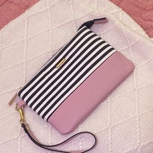 Wristlet good condition used only twice. Multiple card slots and interior zipper